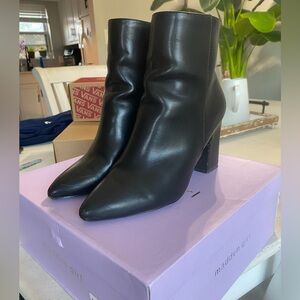 Black pointed toe booties